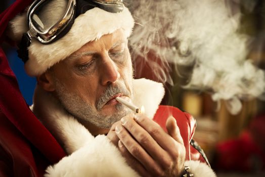 Bad Santa smoking a joint
