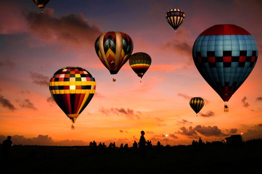 Balloon race at sunrise