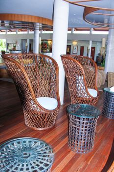 Large wicker chairs in the lobby