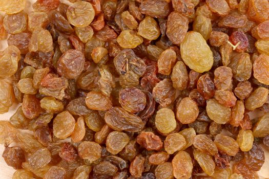 Close up of golden raisins.