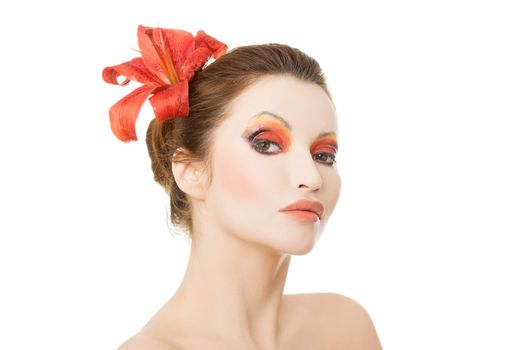 Beautiful woman with a red lily