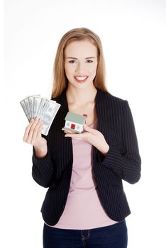 Beautiful business woman holding dollar currency and house.