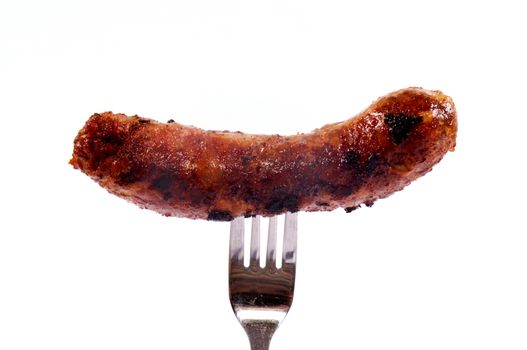 Sausage on fork