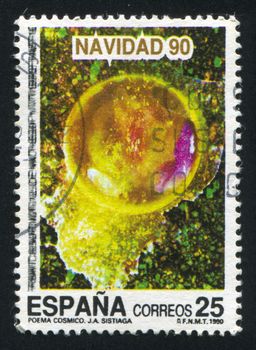 SPAIN - CIRCA 1990: stamp printed by Spain, shows Christmas: Scenes from the film ���Cosmic Poem��� by Jose Antonio Sistiaga, circa 1990