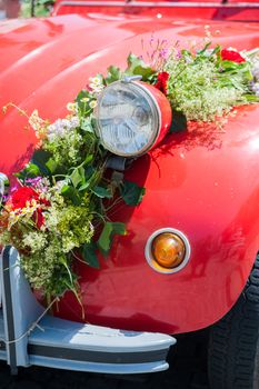 Front of a wedding car