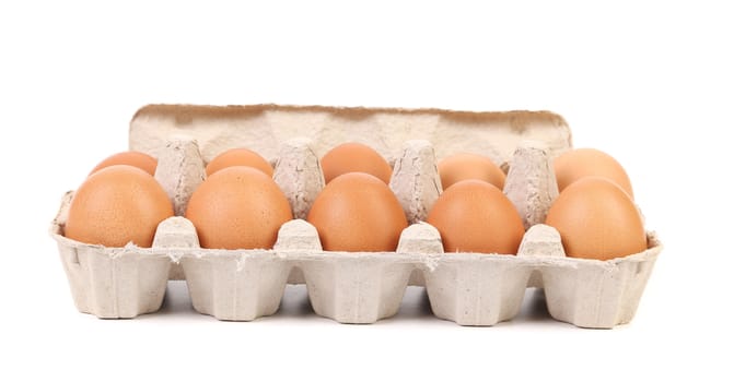 Cardboard egg box with ten brown eggs
