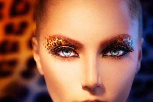 Beauty Fashion Model Girl with Holiday Leopard Makeup