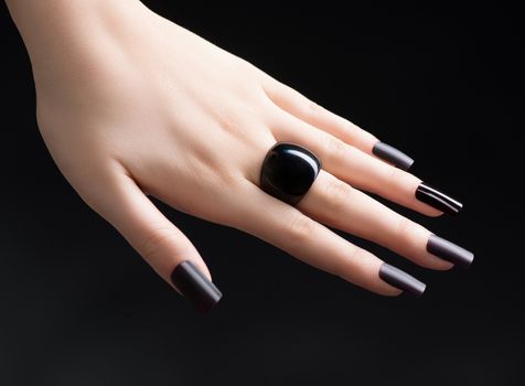 Manicured Nail with Black Matte Nail Polish. Fashion Manicure 