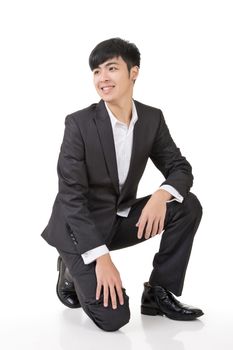 Asian business man squat