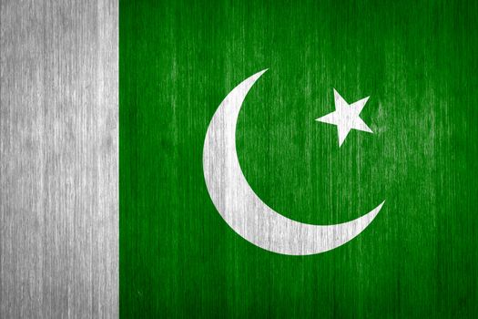 Pakistan Flag on wood background