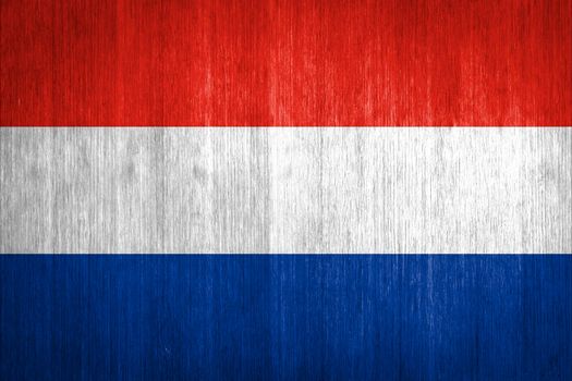Netherlands Flag on wood background
