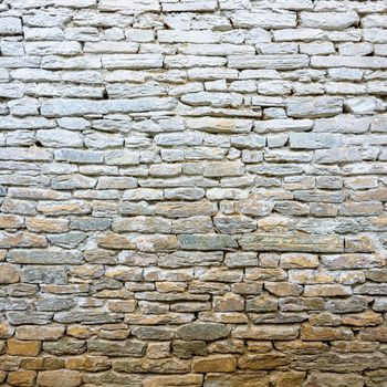 Whitewash old stone wall