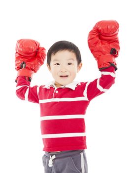 happy young kid with boxing glove in winning pose