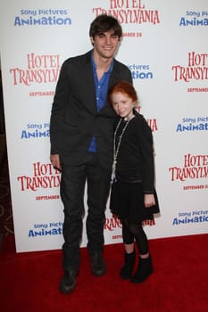 RJ Mitte and sister
at the "Hotel Transylvania" Los Angeles Premiere, Pacific Theatres  Los Angeles, CA 09--22-12/ImageCollect