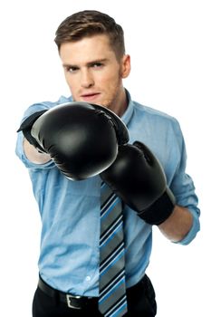 Businessman in punching posture
