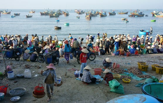  Crowed atmosphere at seafood market on beach