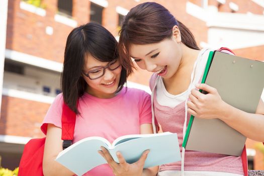 two students discuss homework  happily
