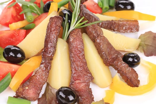 Salad with beef fillet and vegetables.