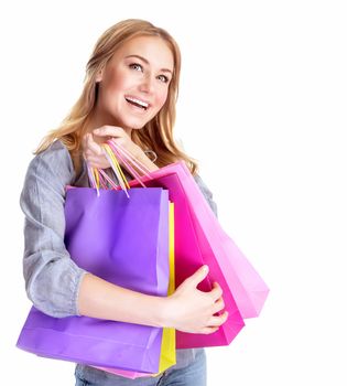 Excited female with shopping bags