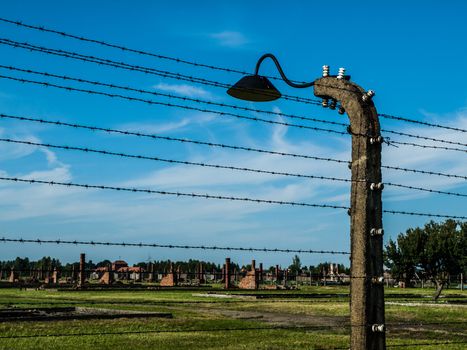 Barb wires and lamp in Birkenau