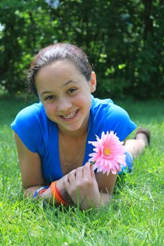 Pretty girl holding a flower 