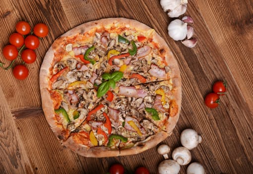 Tasty pizza with mushrooms and colorful pepper
