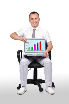 man sitting on chair and holding laptop with chart