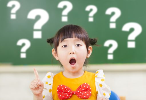 astonishment little girl is full of questions