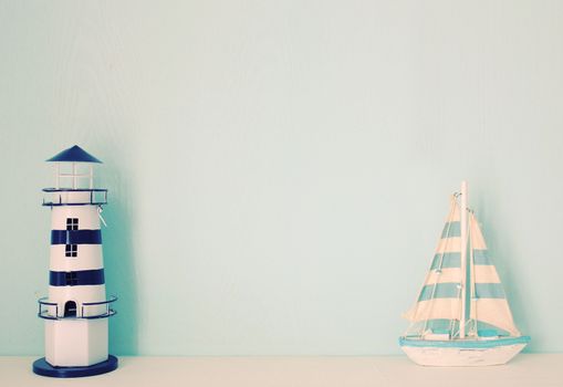 Lighthouse and ship model for decorated in room with retro filter effect