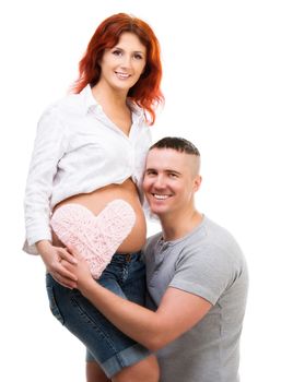 Husband hugs his pregnant wife belly isolated on white
