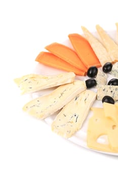 Cheeseboard with black olives.