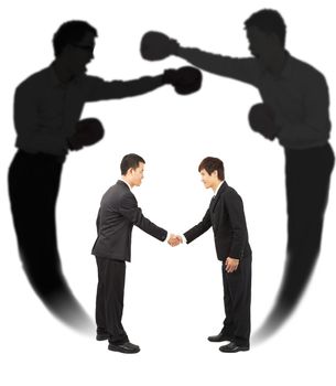 Two businessman handshake with fighting shadow