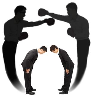 Two businessman bow each other with fighting shadow