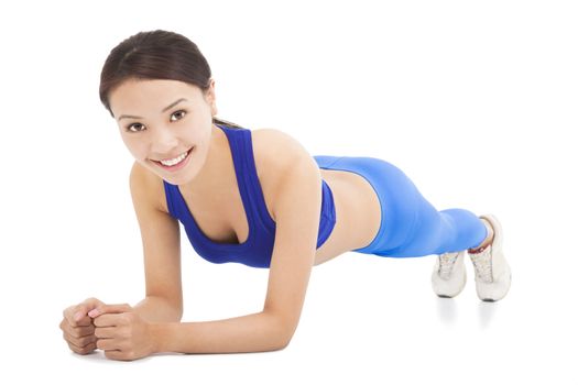 young sporty woman doing core exercise