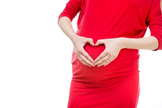 beautiful pregnant woman holding hands in heart shape isolated in a white background