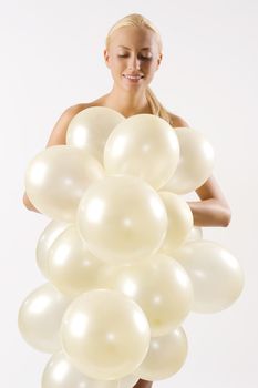 blond girl and balloons