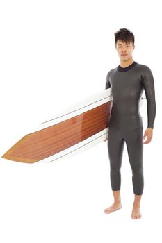 surfing man  holding surfing board in studio