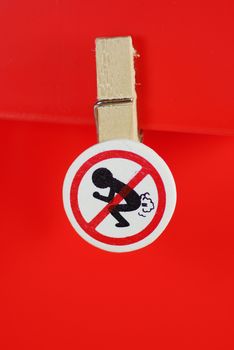 fart prohibit sign on wooden clip,shallow focus