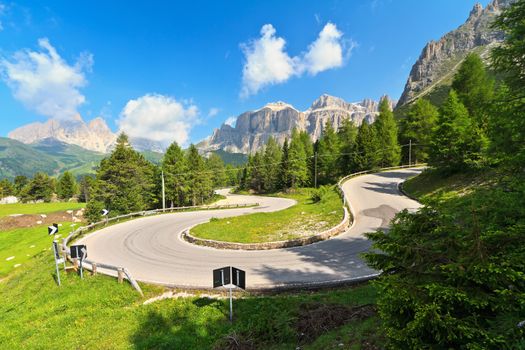 Dolomiti. winding road from Canazei to Pordoi pass, Trentino, Italy
