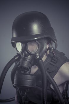 Inhalation, Man with black gas mask, pollution concept and ecolo