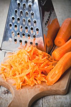 metal grater and carrot
