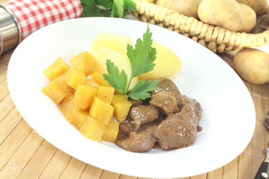 Venison goulash with turnip, parsley and cooked potatoes