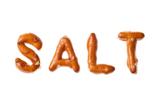 Alphabet pretzel written word SALT isolated 