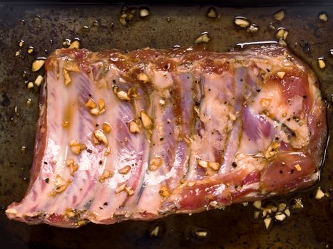 rack of rustic  raw marinated pork rib