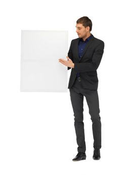 handsome man in suit with a blank board