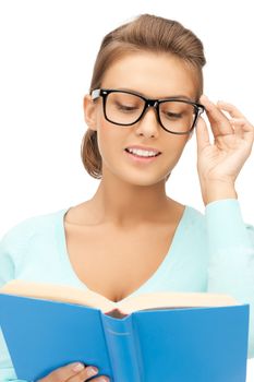 woman in glasses reading book