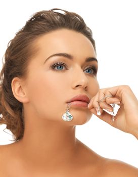 woman diamond pendant in mouth