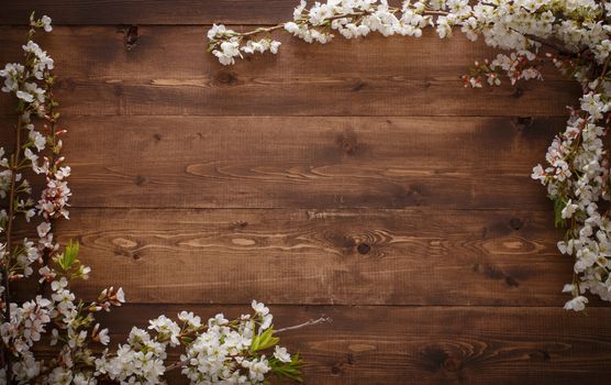 Flowers on wood texture background