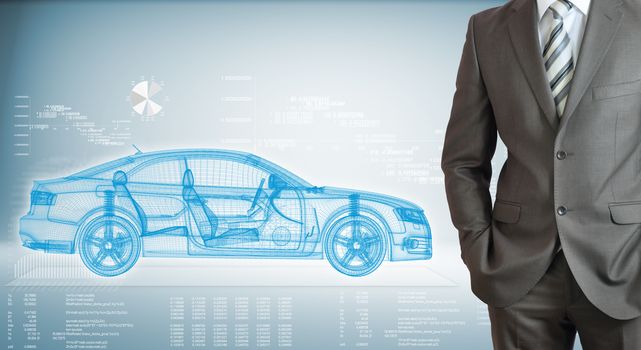 Businessman with high-tech car and graphs