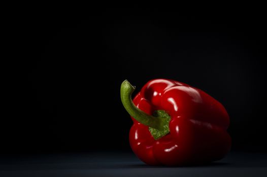 Fresh whole red bell pepper or capsicum